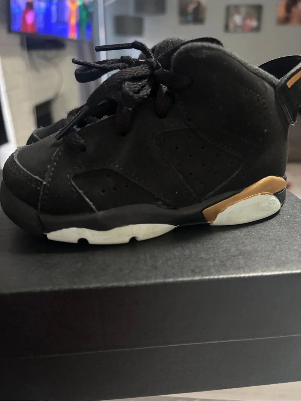 Jordan Kids Black and Gold High-Top Sneakers